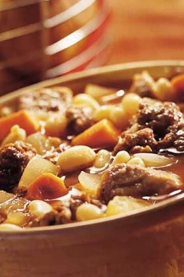 Brazilian pork stew with corn dumplings